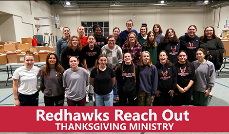 Redhawk student athletes while participating in a food drive.